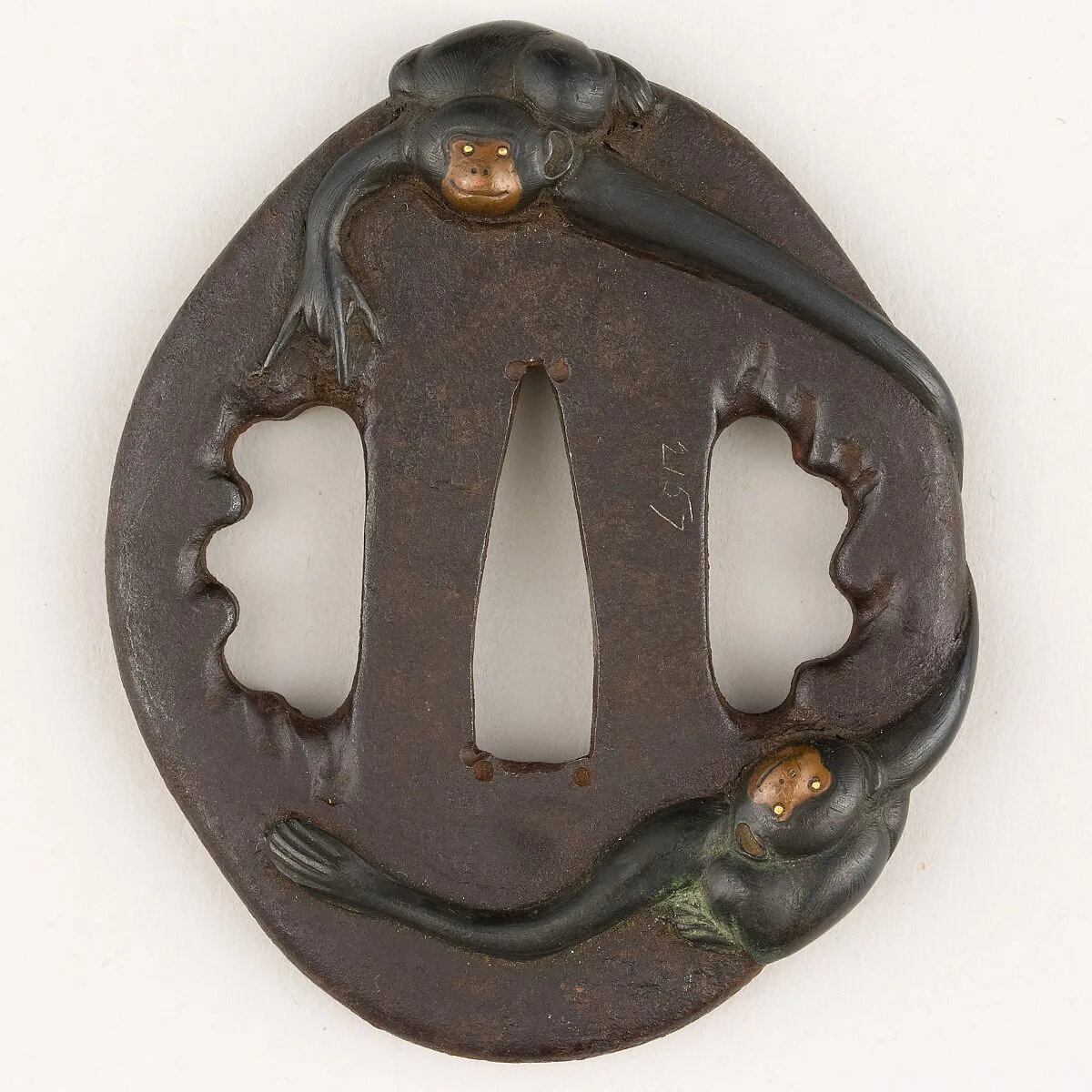 Sword Guard (<i>Tsuba</i>) Depicting Two Gibbons (二疋手長猿図鐔) — Unknown
