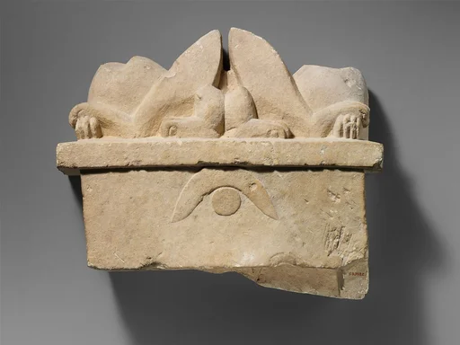 Limestone funerary stele with two recumbent sphinxes