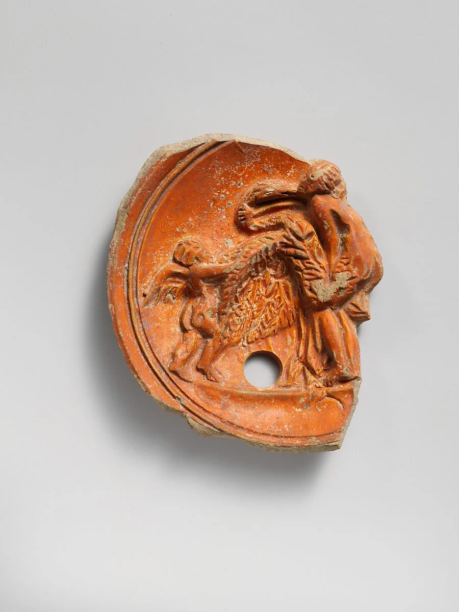 Terracotta relief from a lamp with Leda and the swan — Unknown