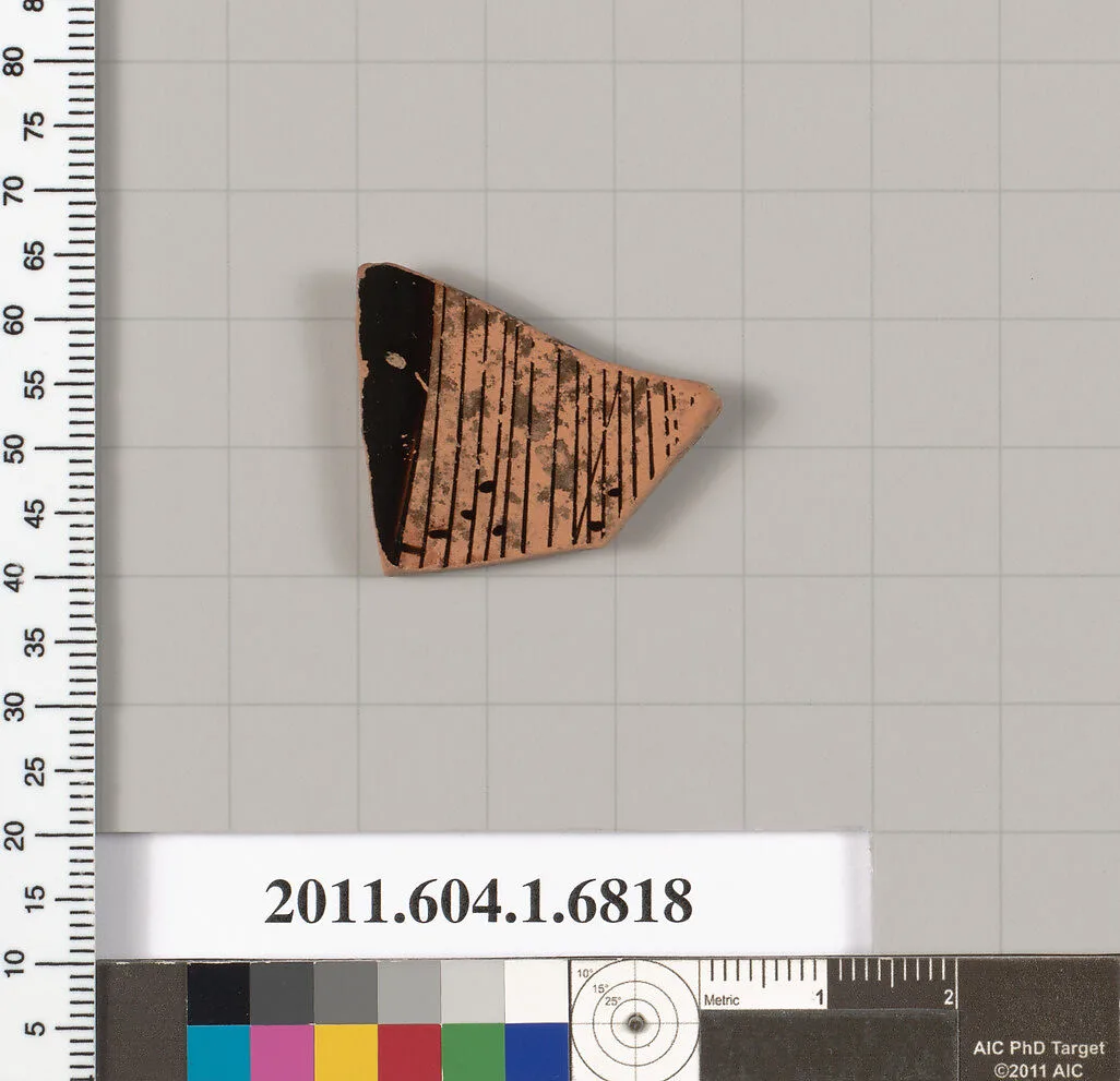 Terracotta fragment of a kylix (drinking cup) — Brygan