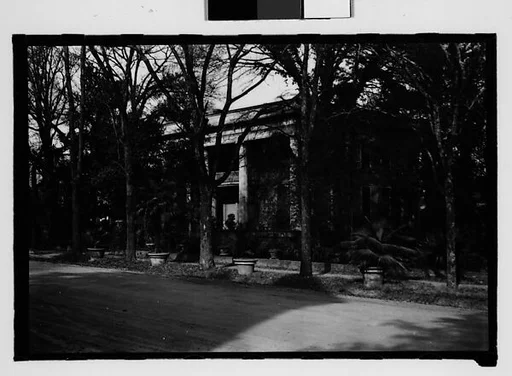 [Greek Revival House with Full Facade Porch, Through Trees, Savannah, Georgia]