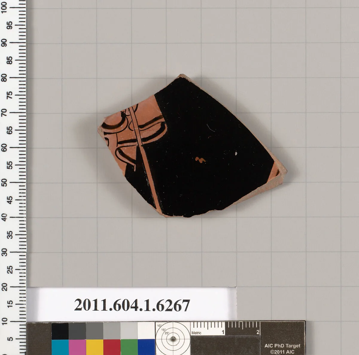 Terracotta fragment of a kylix (drinking cup) — Onesimos