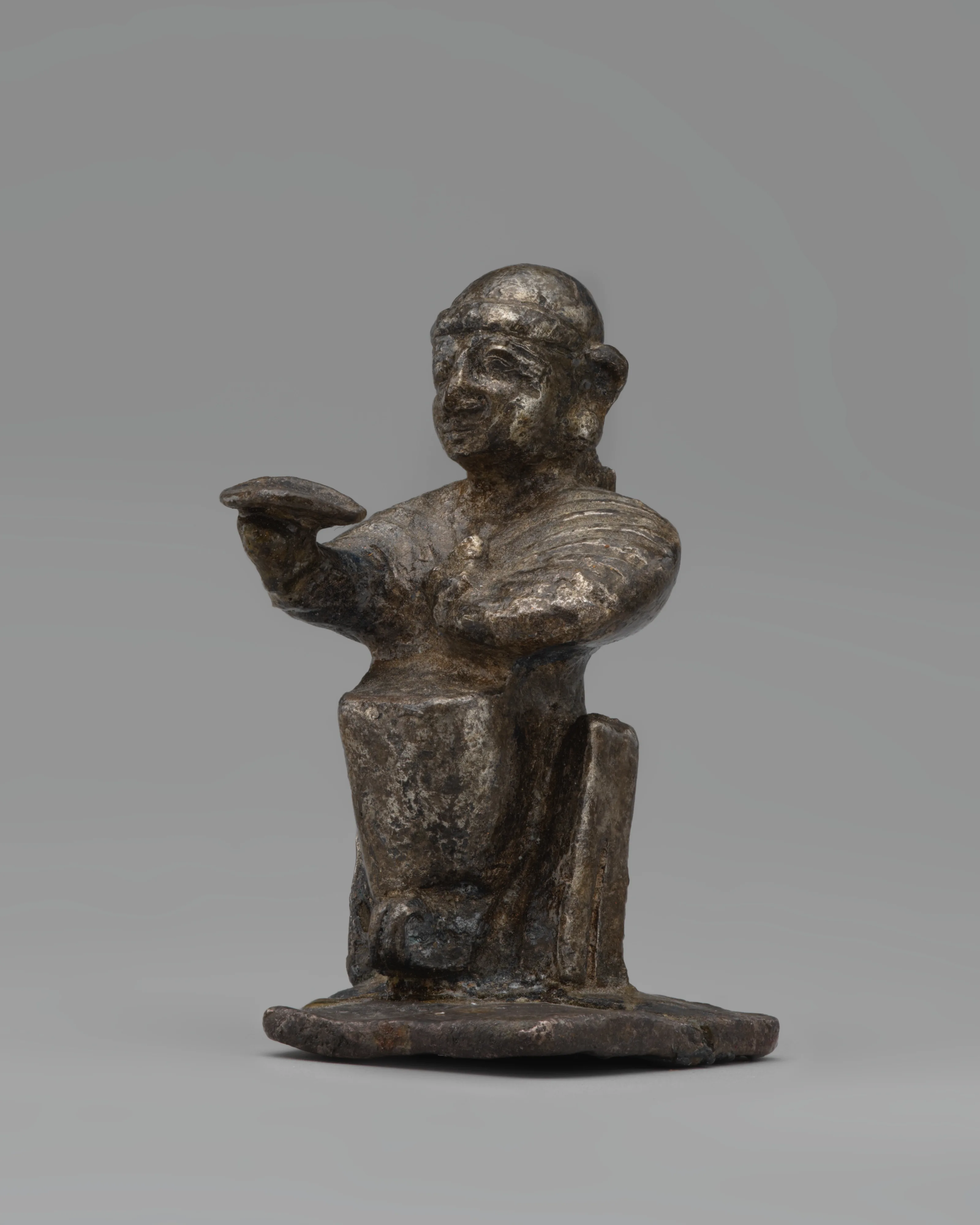 Seated female — Unknown