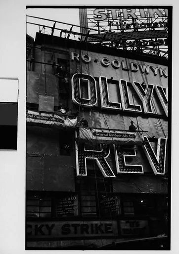 [Workers Mounting Neon Sign for "Hollywood Revue of 1929", Times Square, New York City]