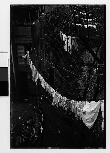 [Three 35mm Film Frames: Backyard Clotheslines, Children on Street, Houses on Hillside, Ossining, New York]