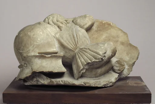Boy Mourner resting on Helmet and Shield