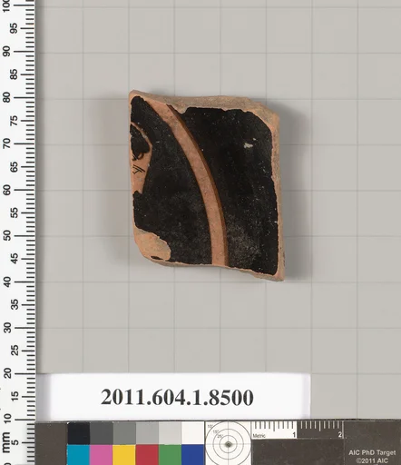 Terracotta fragment of a stemless kylix (drinking cup)