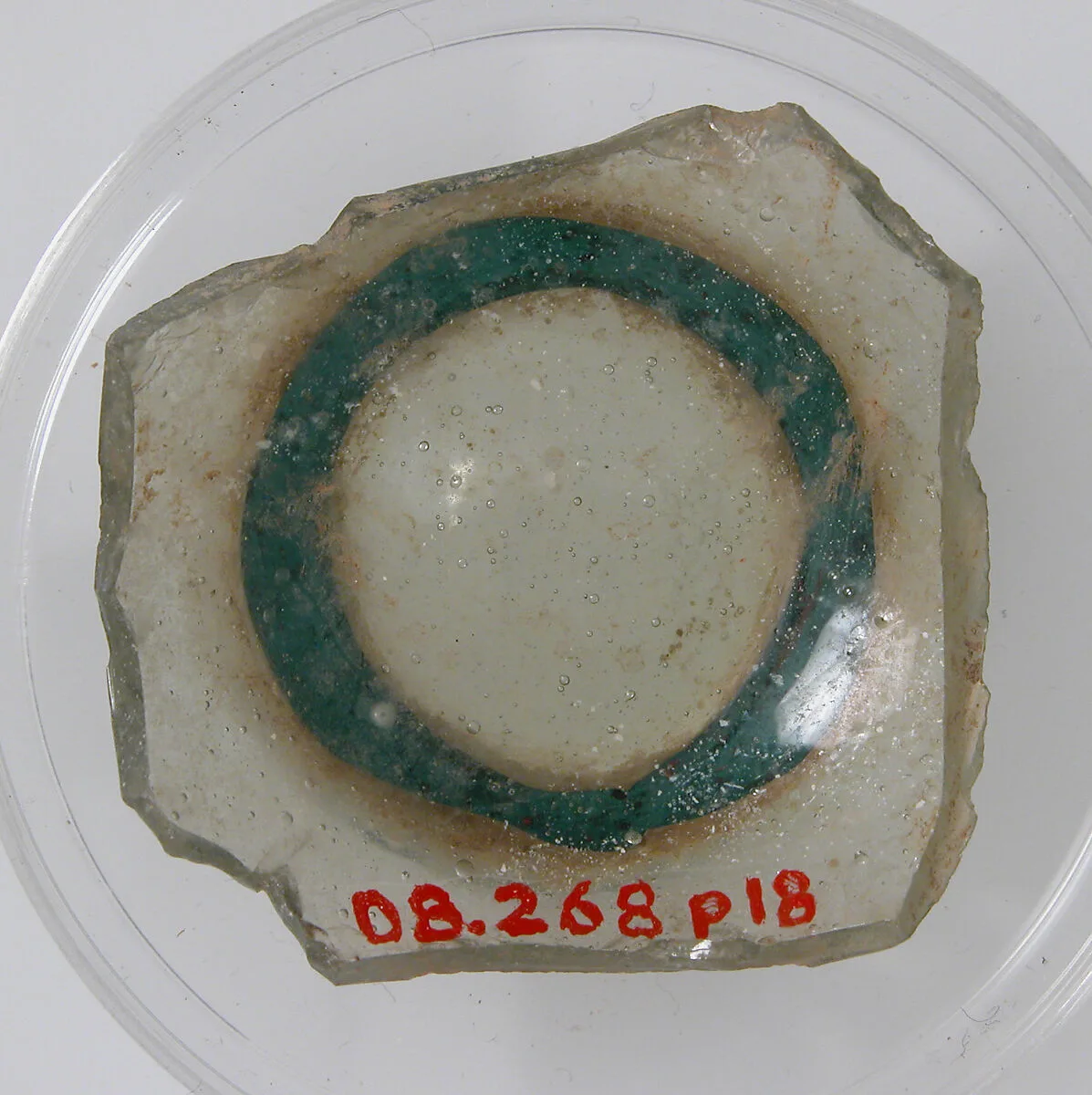 Bottom of a Vessel with Foot — Unknown