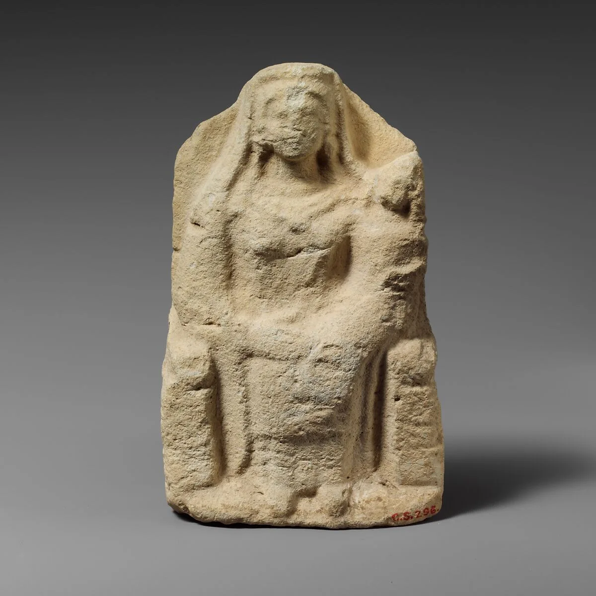 Seated limestone kourotrophos — Unknown