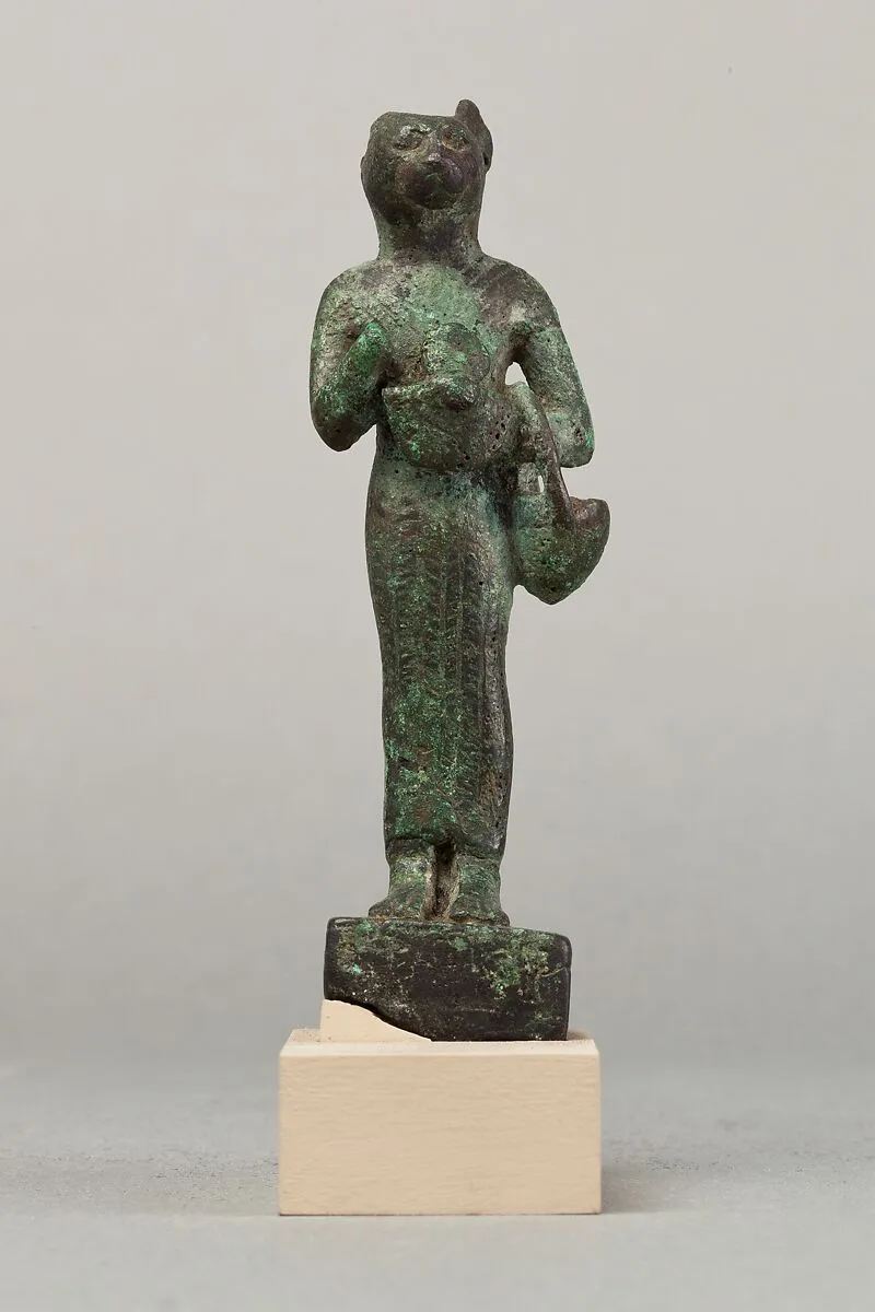 Bastet with lion-headed aegis and basket — Unknown