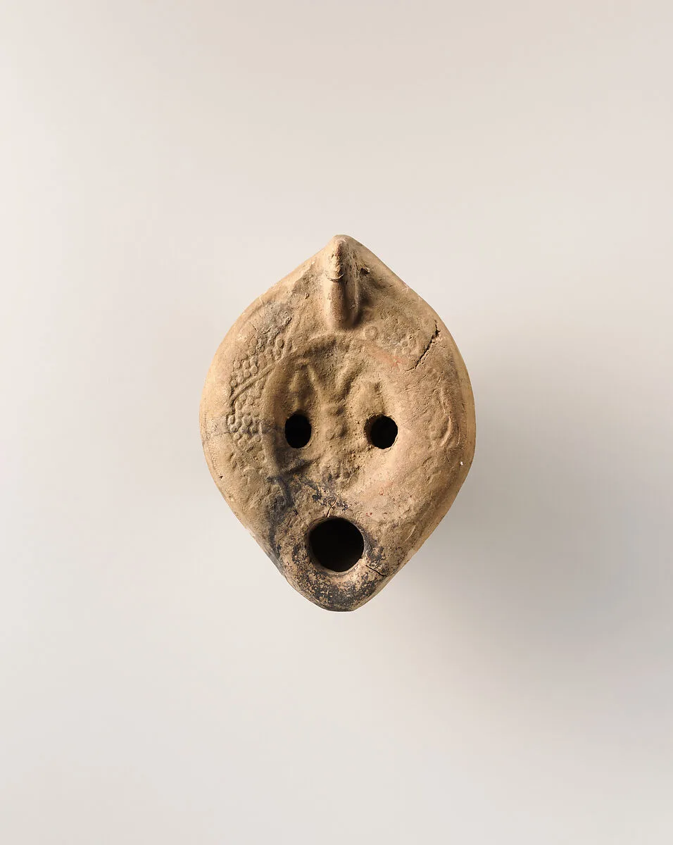 Terracotta oil lamp — Unknown
