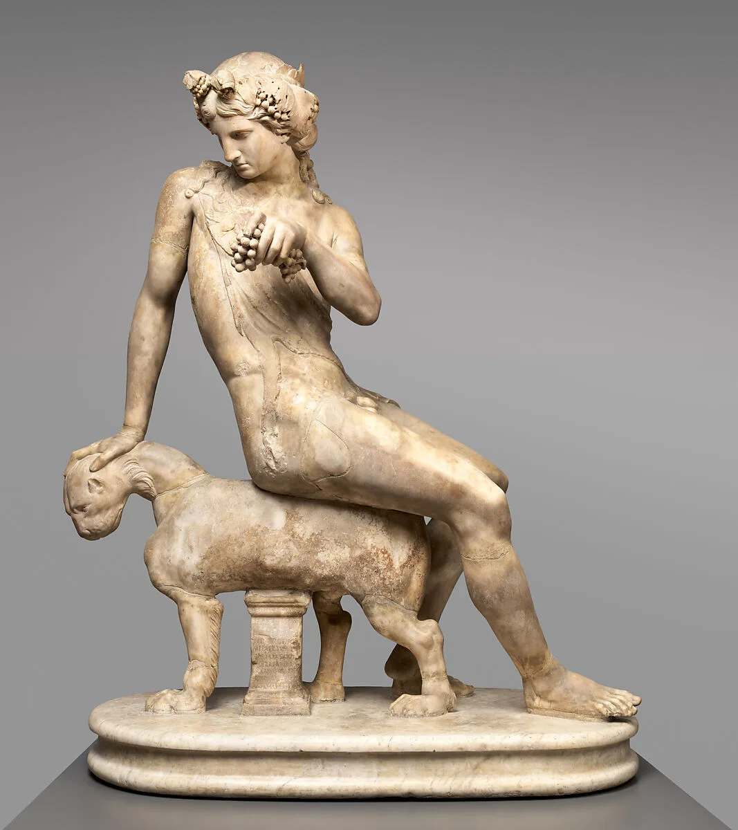 Marble statue of Dionysos seated on a panther — François Duquesnoy