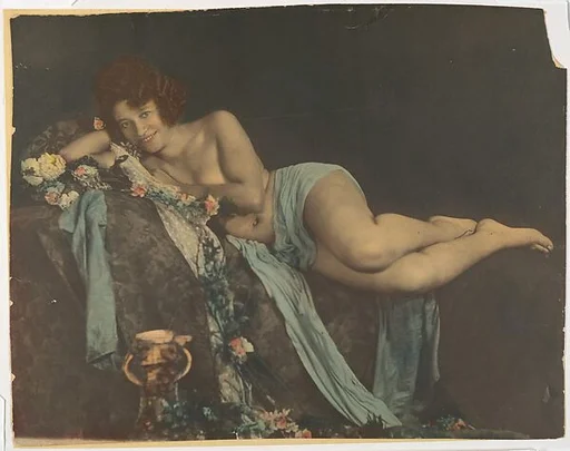 [Nude Draped with Cloth Surrounded by Flowers]