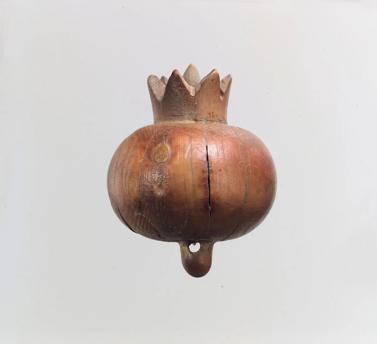 Pomegranate carved in the round — Unknown