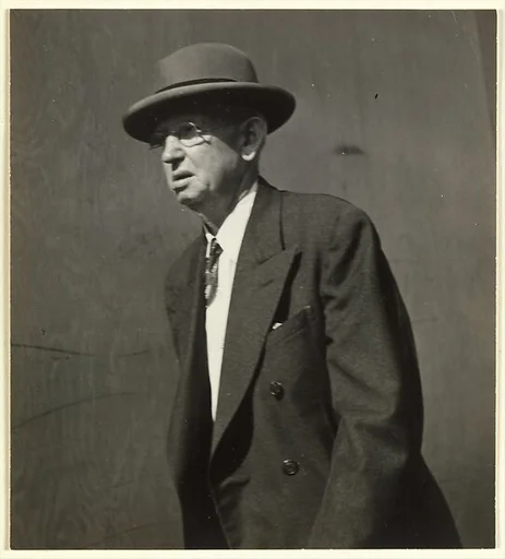 [Male Pedestrian in Dark Suit and Bowler Hat, Detroit (for Fortune Magazine Article "Labor Anonymous")]