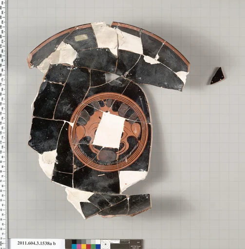 Terracotta fragments of a kylix: eye-cup (drinking cup)