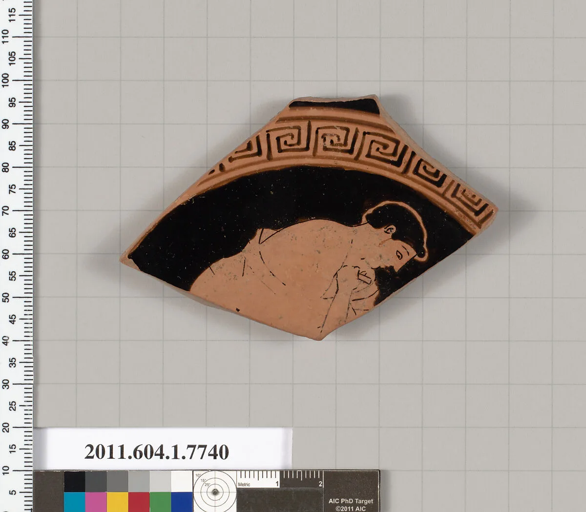 Terracotta fragment of a kylix (drinking cup) — Boot Painter