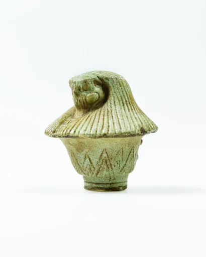Top of papyrus scepter amulet with falcon head