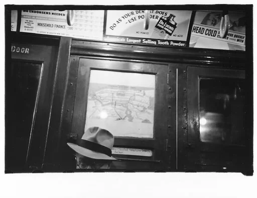 [Four 35mm Film Frames: Subway Passengers, New York City: Man in Hat, Young Man Wearing Eyeglasses, Man in Hat Beneath Metropolitan Museum Concert Poster]