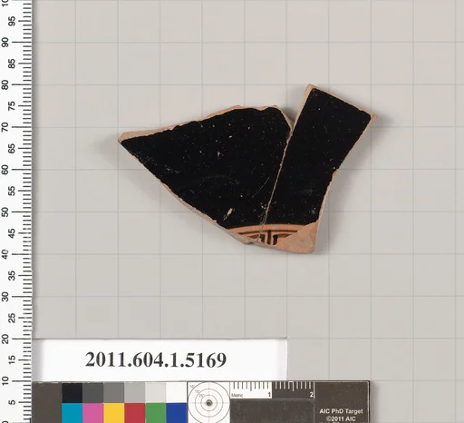 Terracotta fragment of a kylix (drinking cup)