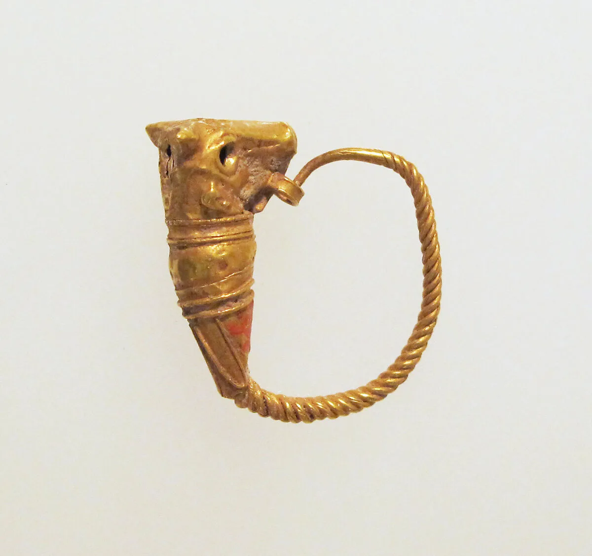 Gold earring with head of a bull — Unknown