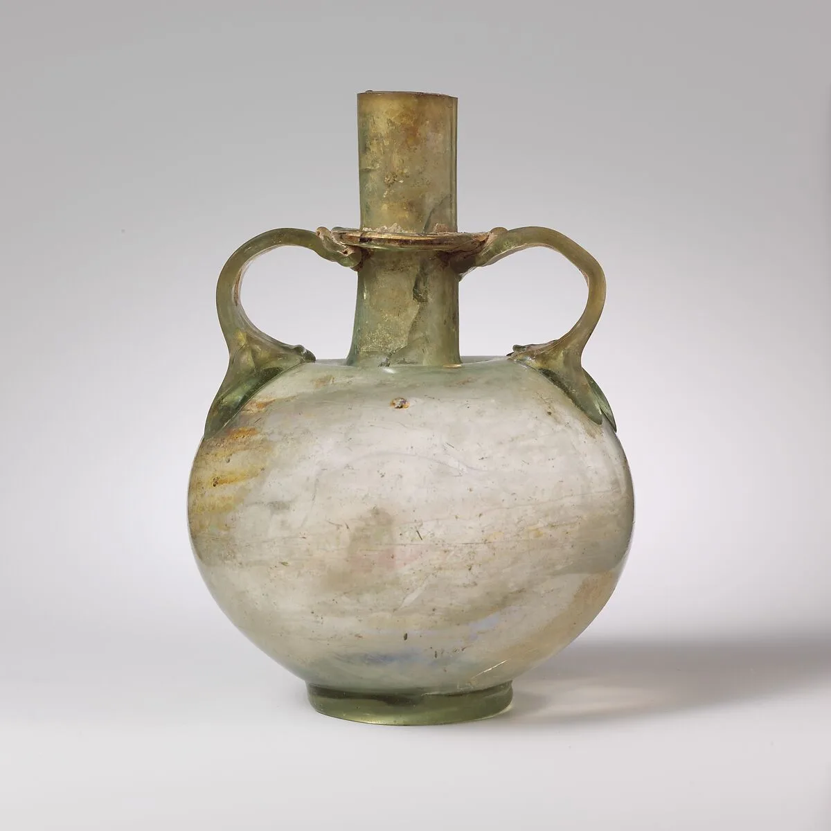 Glass bottle with two handles — Unknown