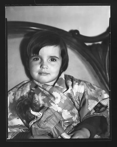 [Young Girl with Doll]