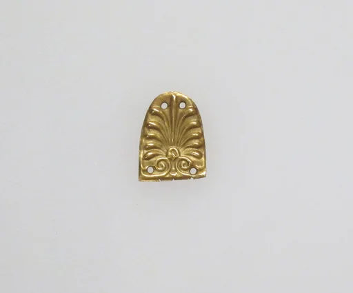Three gold appliqués