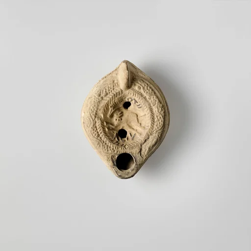 Terracotta oil lamp