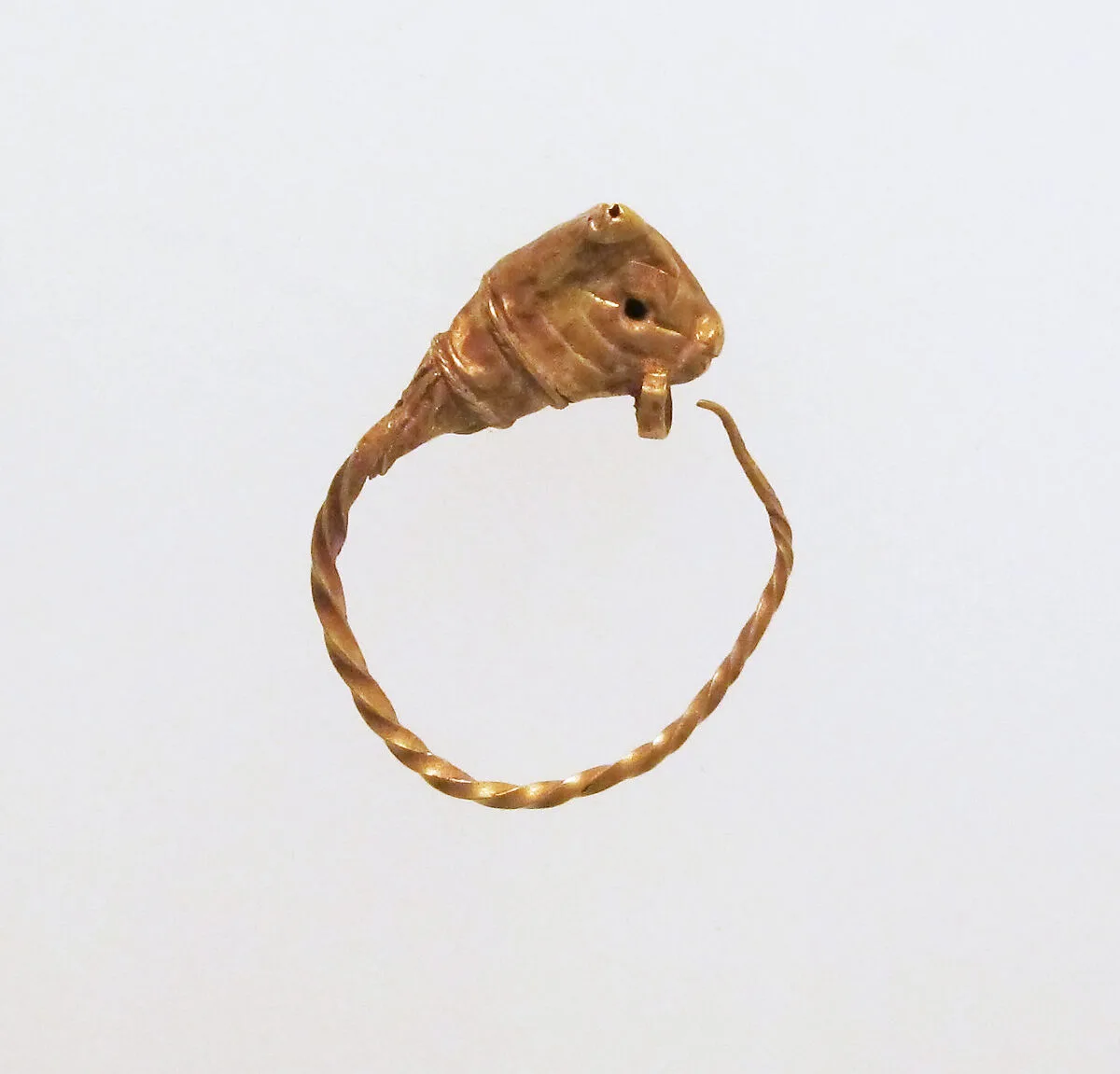Gold earring with head of a bull — Unknown
