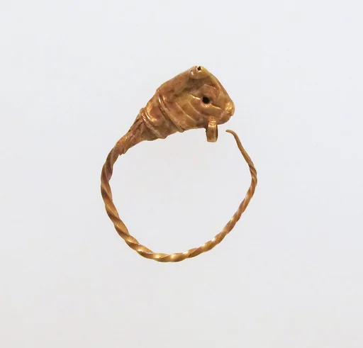 Gold earring with head of a bull