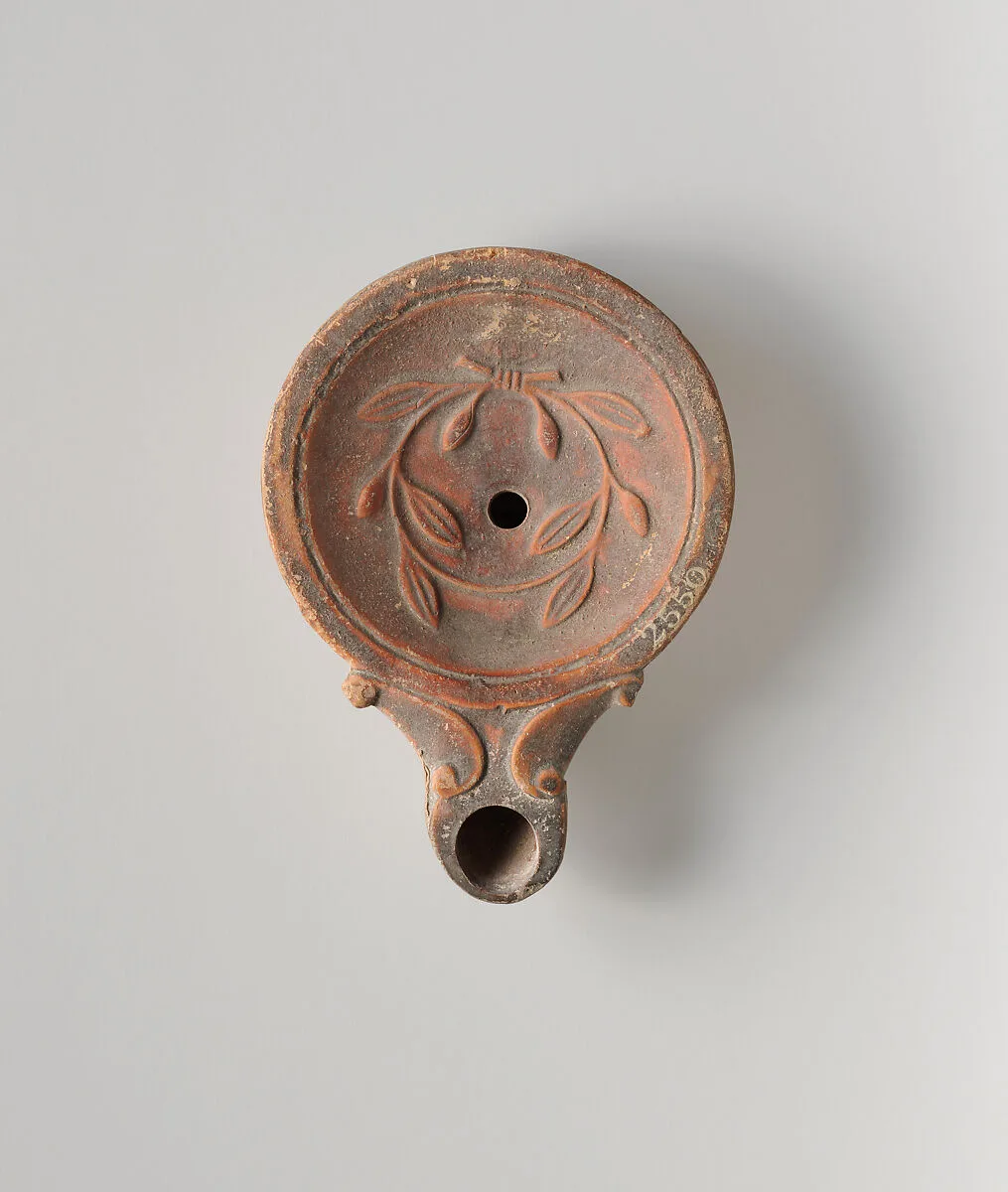 Terracotta oil lamp — Unknown