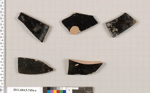 Terracotta fragments of kylikes (drinking cups)