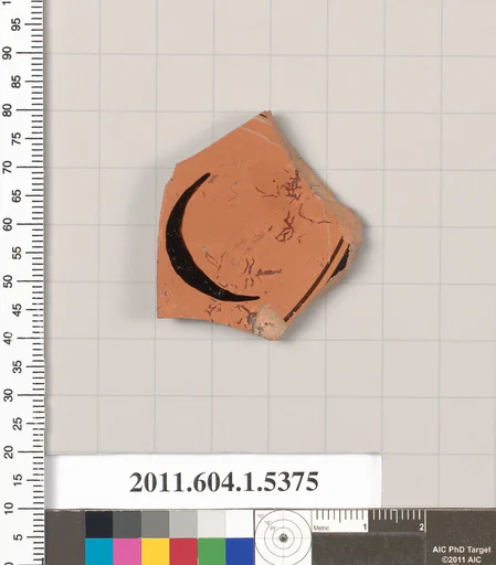 Terracotta fragment of a kylix (drinking cup)