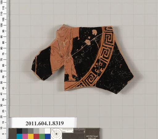 Terracotta fragment of a kylix (drinking cup)