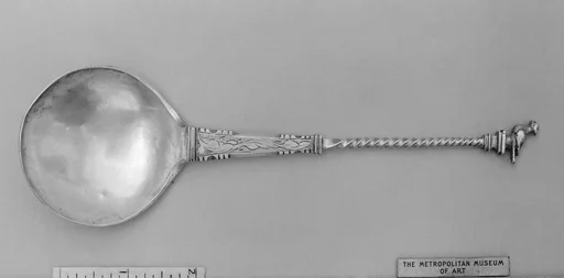 Figure-top spoon