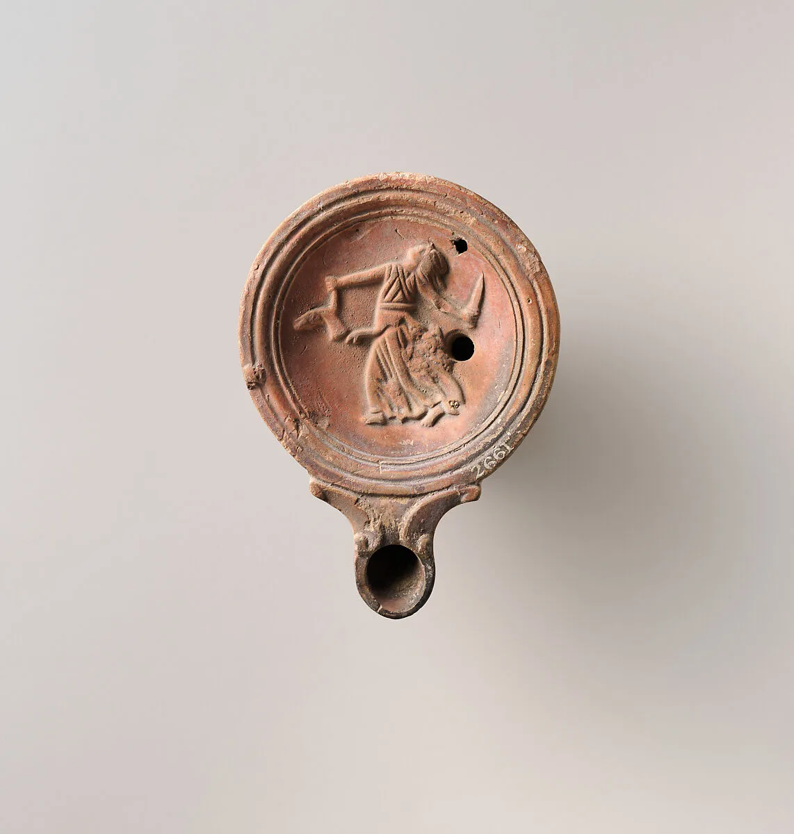 Terracotta oil lamp — Unknown