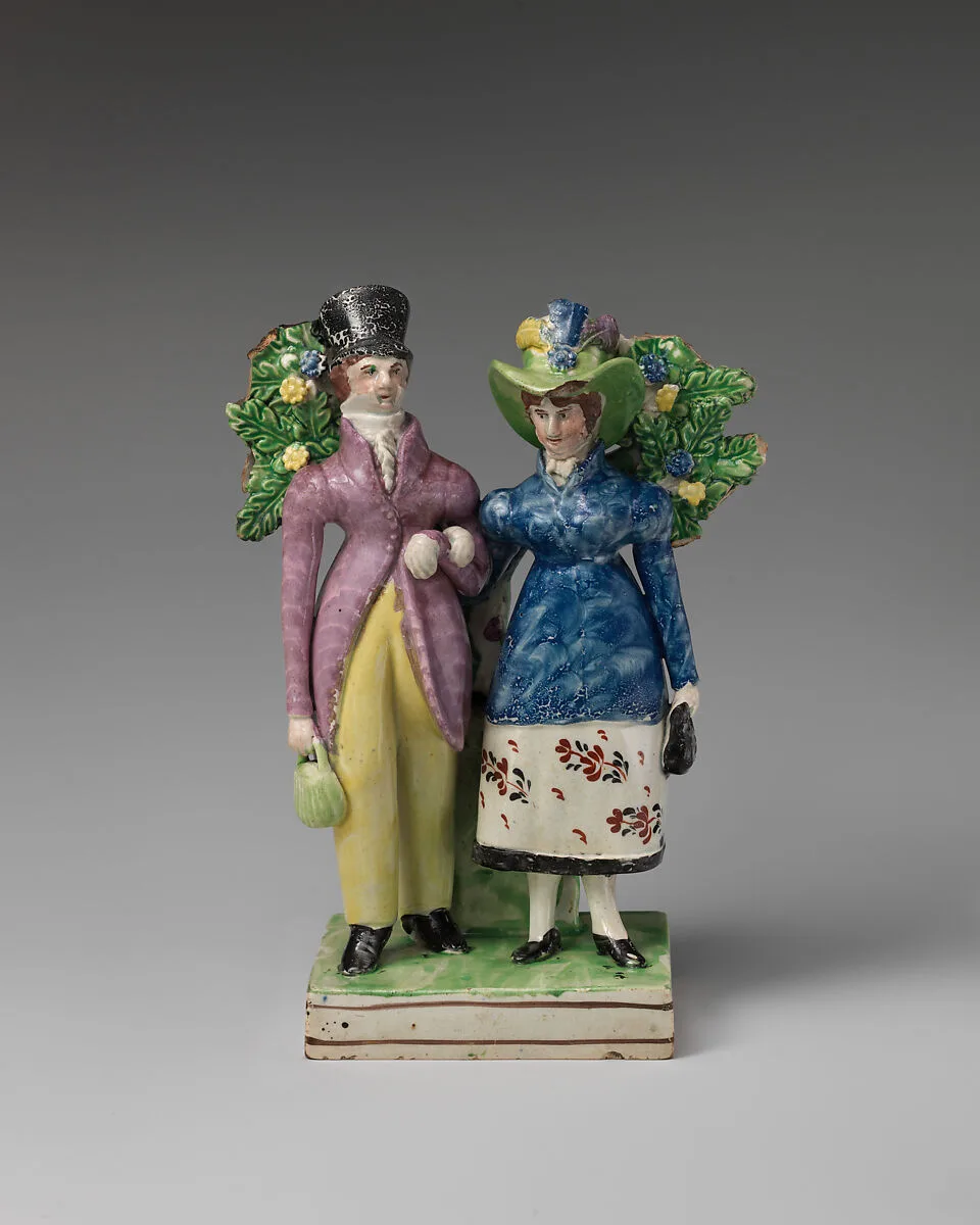 Man and woman standing near a tree — Unknown