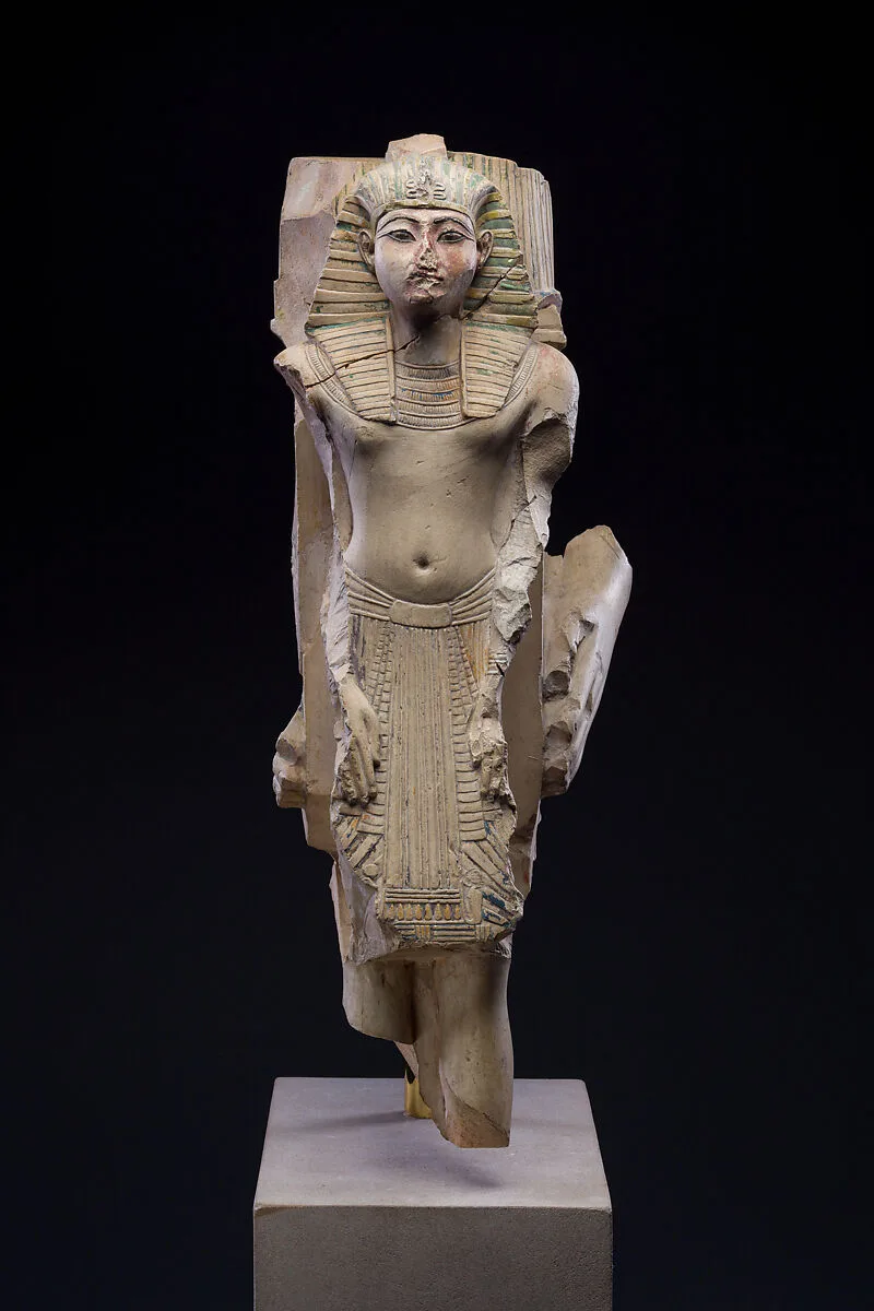 Figure of a king as part of a group proffered by an official of Ramesses II — Unknown