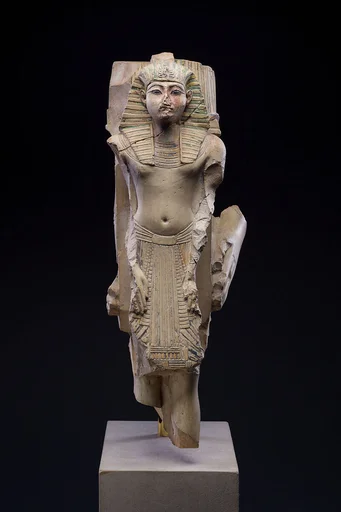 Figure of a king as part of a group proffered by an official of Ramesses II