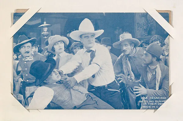 Wm. Desmond battling gunmen in their den from Western Stars or Scenes Exhibit Cards series (W412) — Unknown
