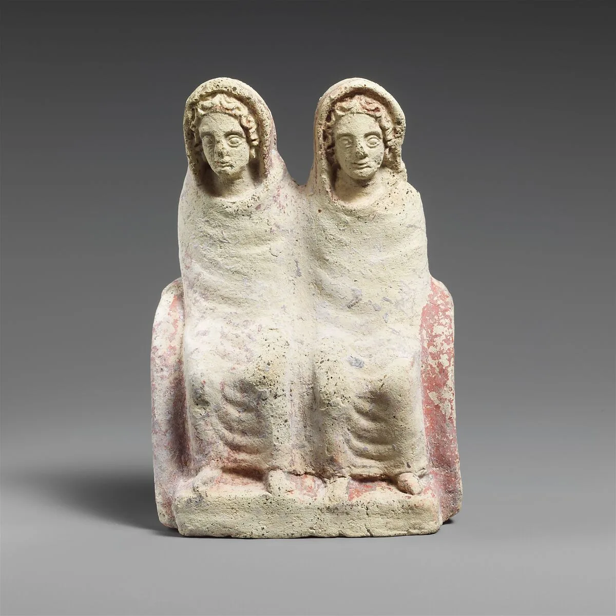 Terracotta votive statuette of two draped females — Unknown