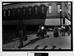 [Street Scene with Pedestrians Crossing Street]