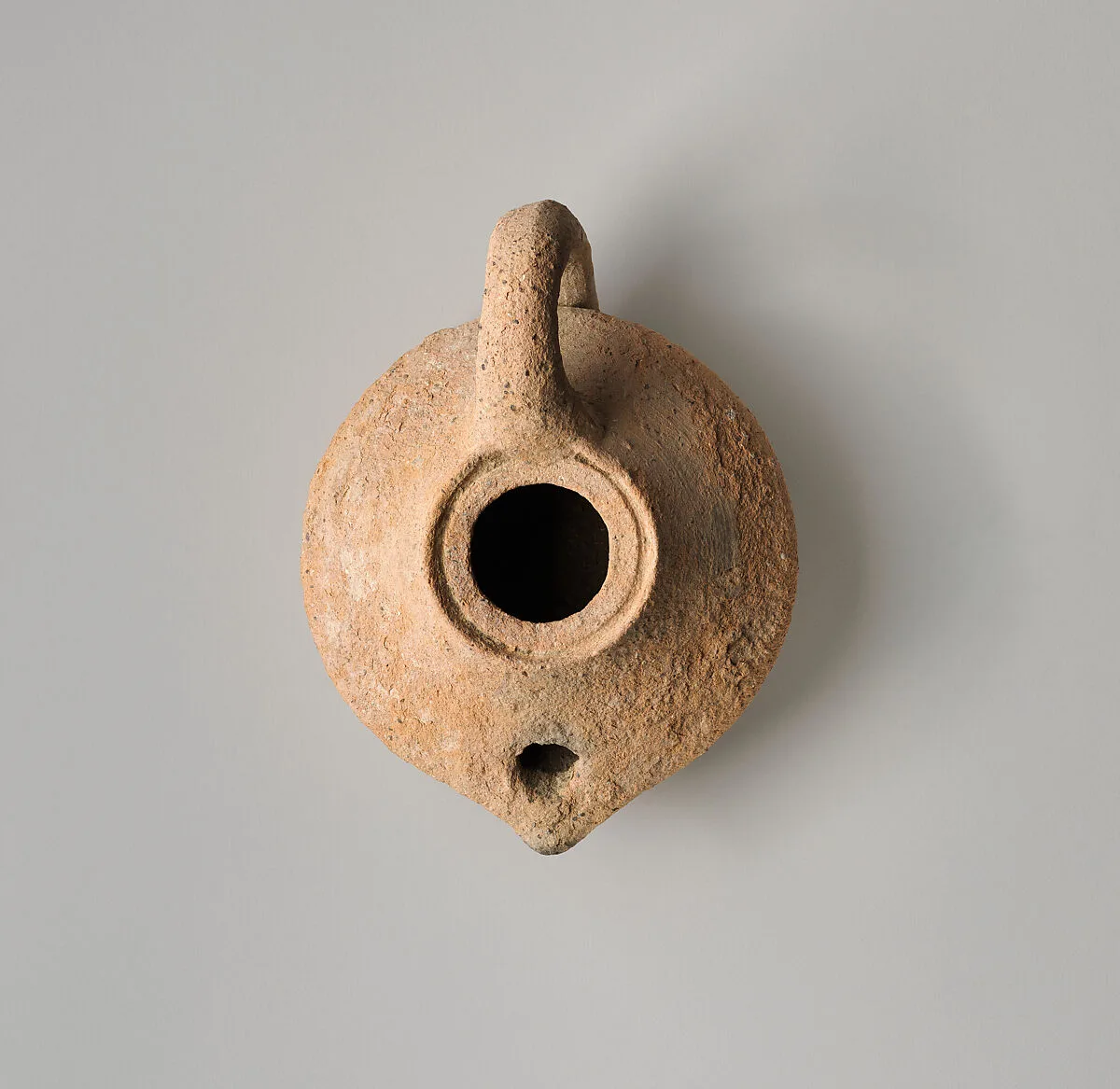 Terracotta oil lamp — Unknown