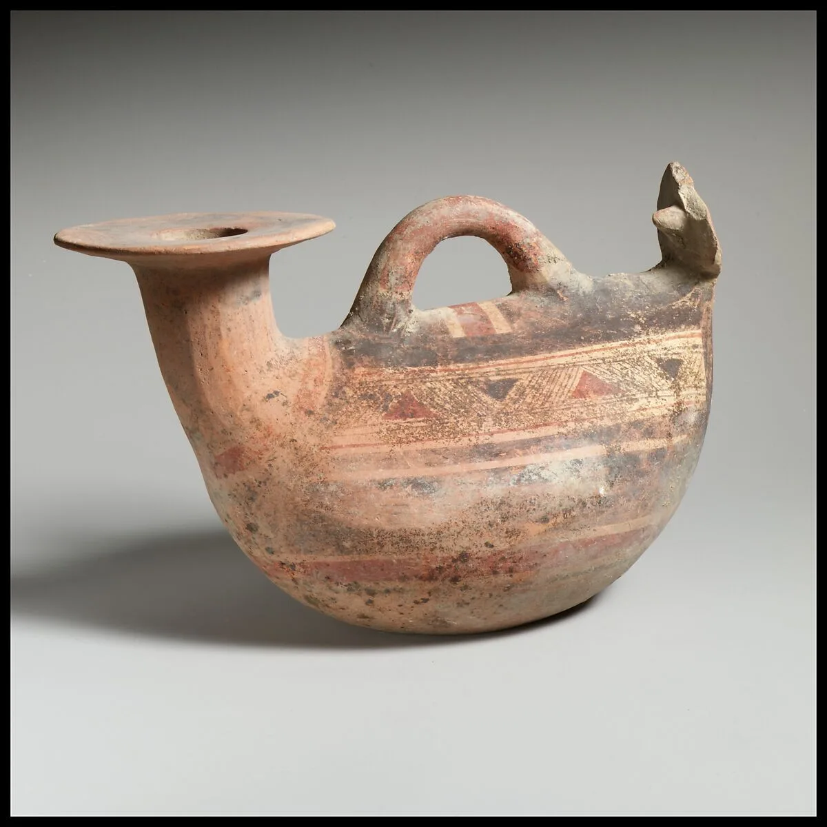 Terracotta askos (flask with a spout and handle over the top) — Unknown