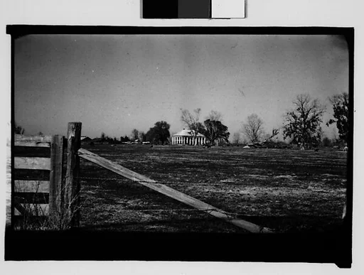 [Plantation House in Field, From Automobile, New Orleans Vicinity, Louisiana]
