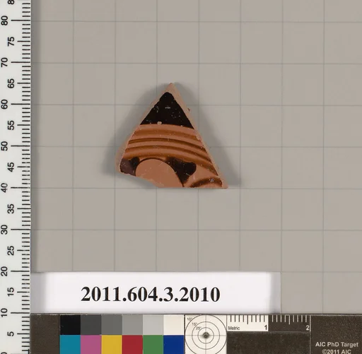 Terracotta fragment of a kylix (drinking cup)