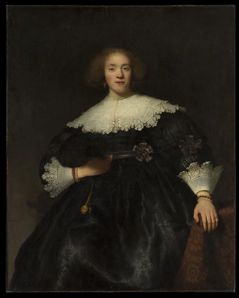 Portrait of a Young Woman with a Fan — Rembrandt (Rembrandt van Rijn)