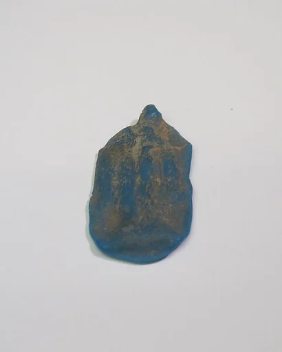 Mold-pressed amulet or fragment