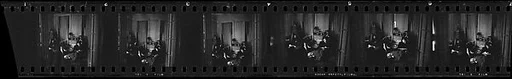 [35 Views of Robert Frank, Mary Frank, and Others at Party]